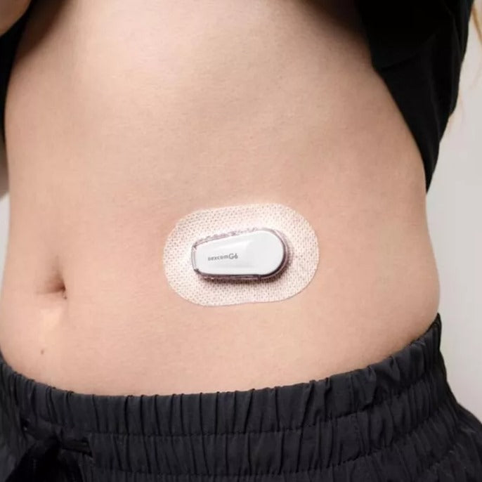 "Dexcom G6 sensor op arm geplaatst", "Dexcom G6 sensor verpakking inhoud"